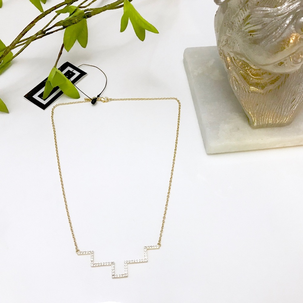 Elizabeth and James gold pyramid necklace $158